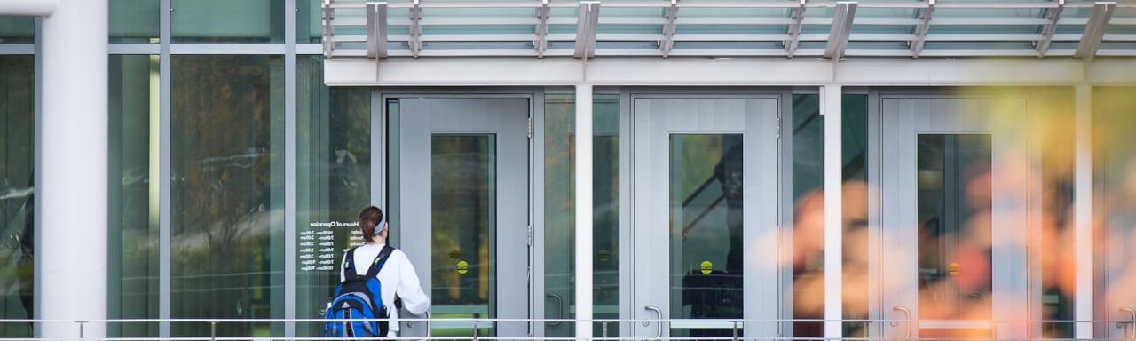 Female student entering library